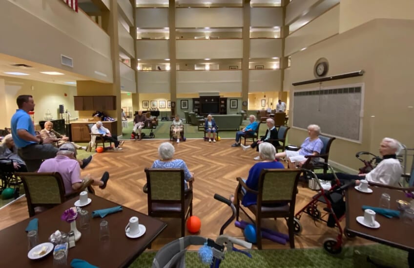 Elderly Socializing and Enjoying an Event in Assisted Living Facility in Venice FL Elderly Socializing and Enjoying an Event in Assisted Living Facility in Venice FL